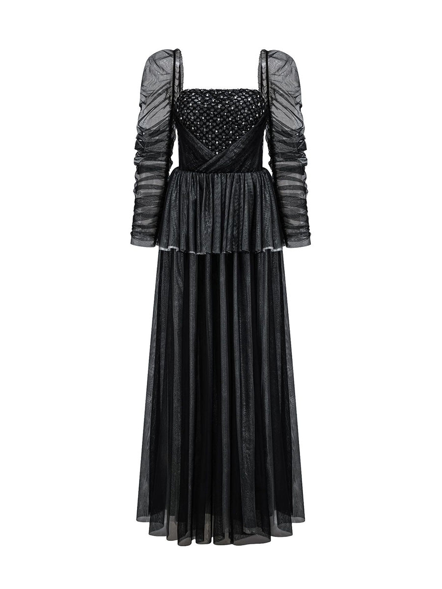 Black dress with sheer sleeves on a white background