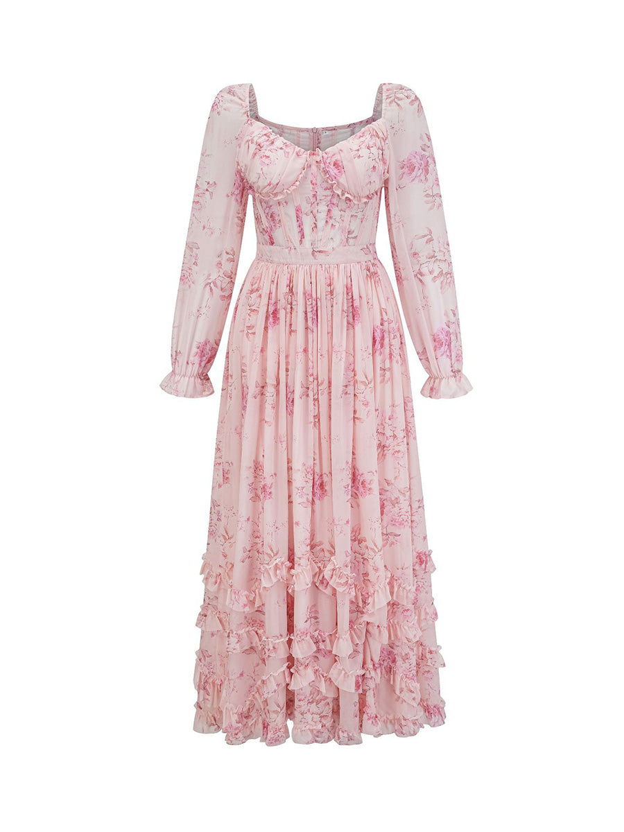 Pink floral dress with long sleeves on a white background