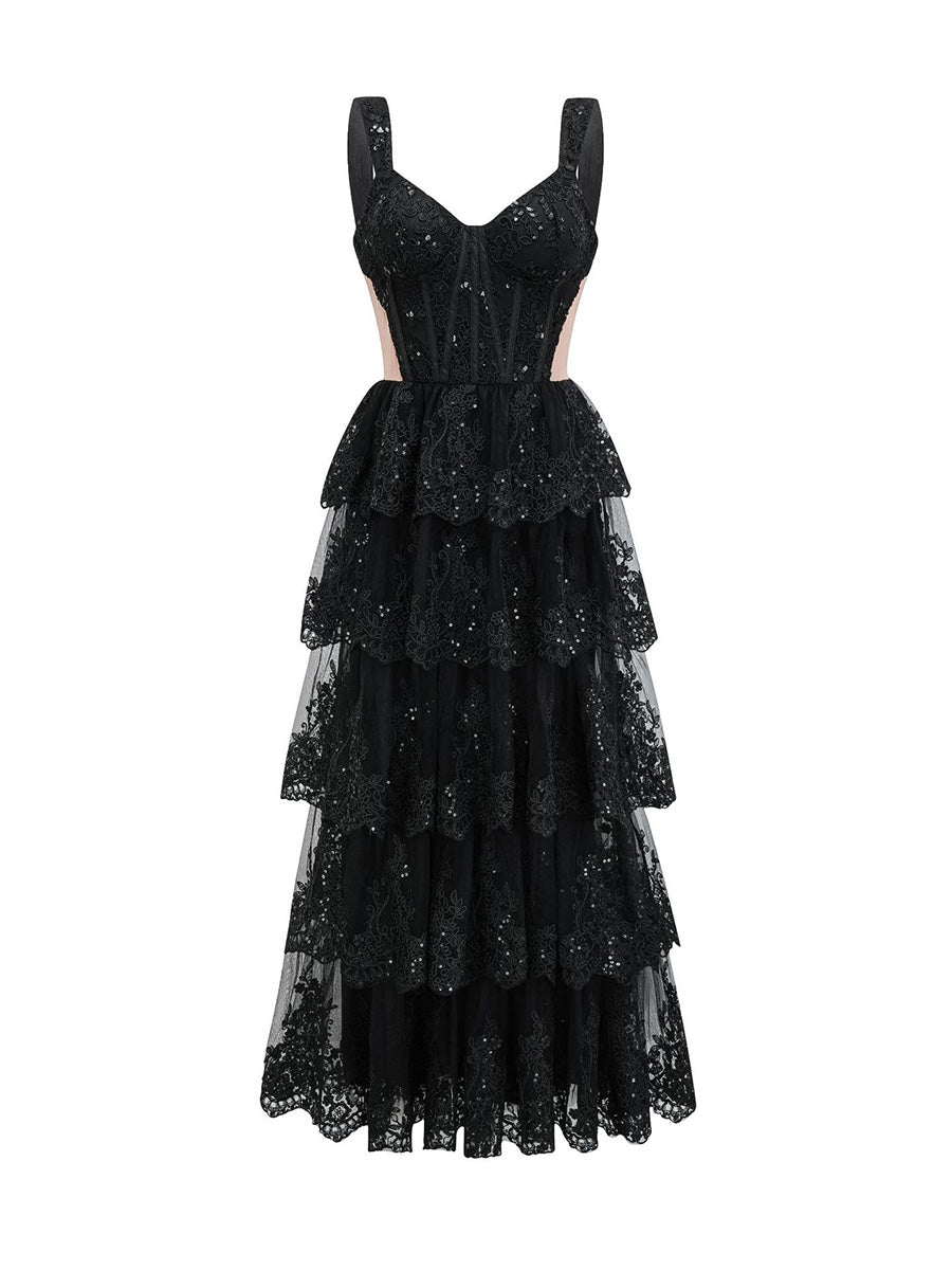 Black tiered dress with sequin detailing on a white background