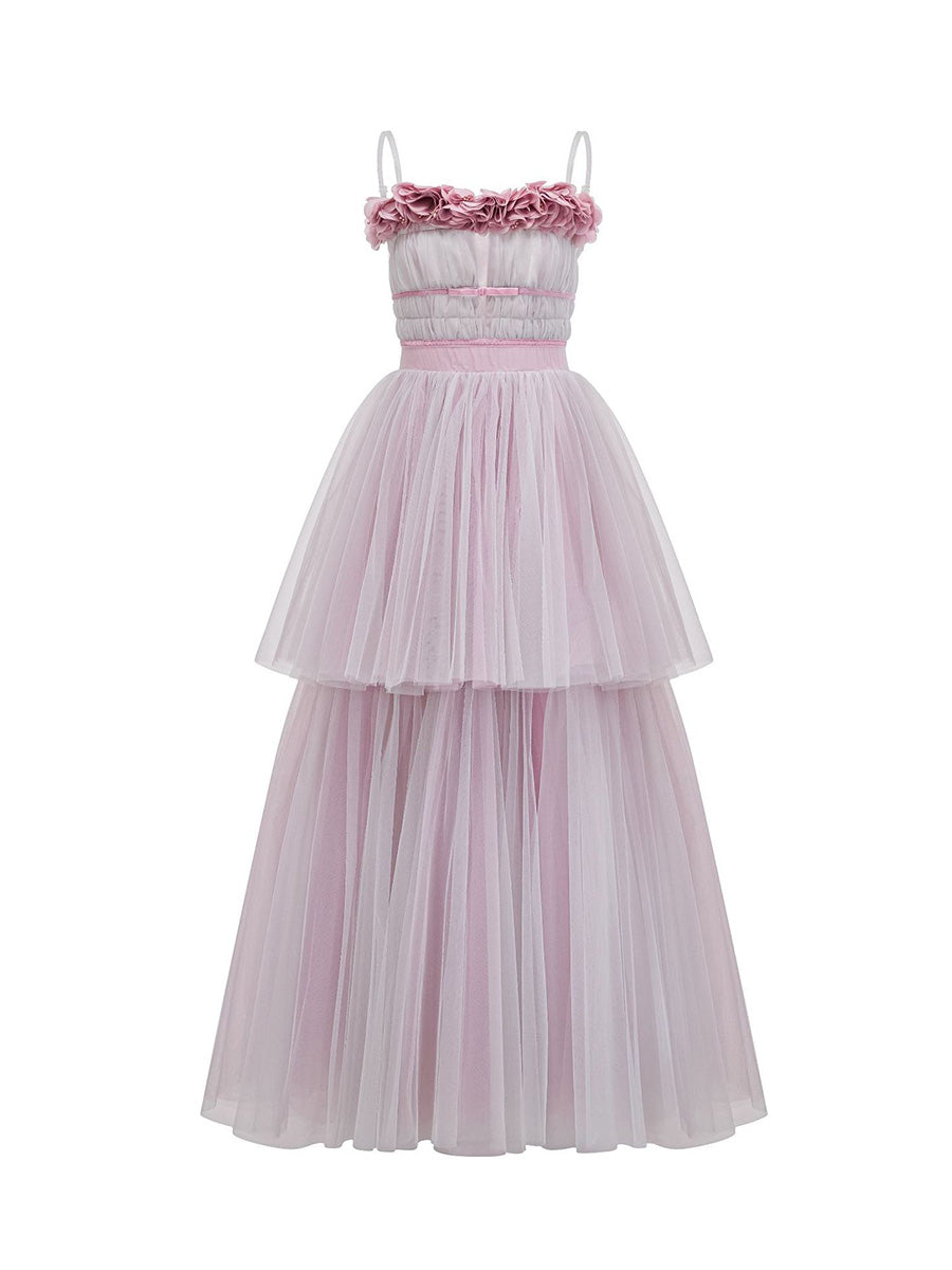 Pink evening gown with floral details on a white background