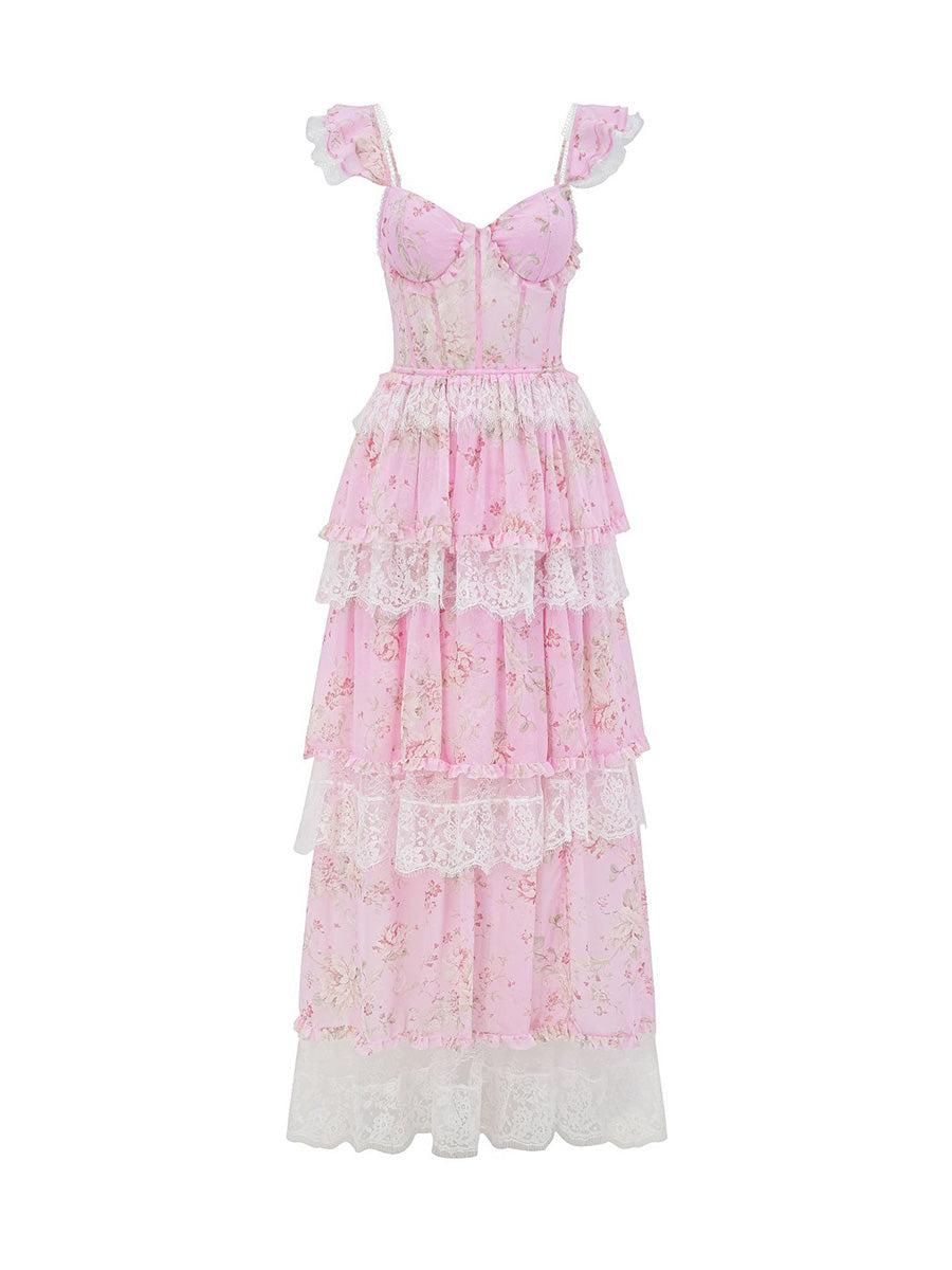 Pink floral tiered dress on a white background