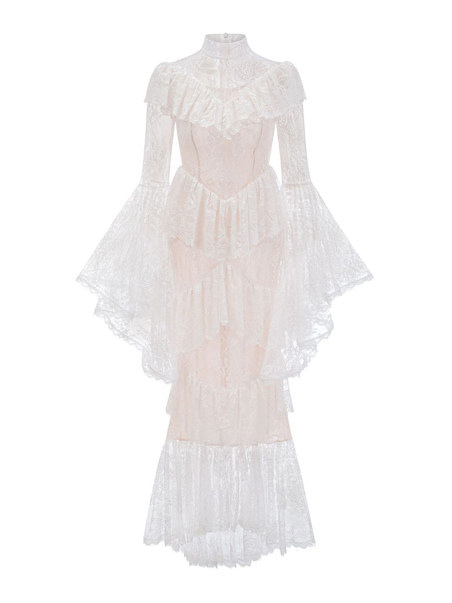 Delicate white dress with ruffled sleeves and hem on a white background