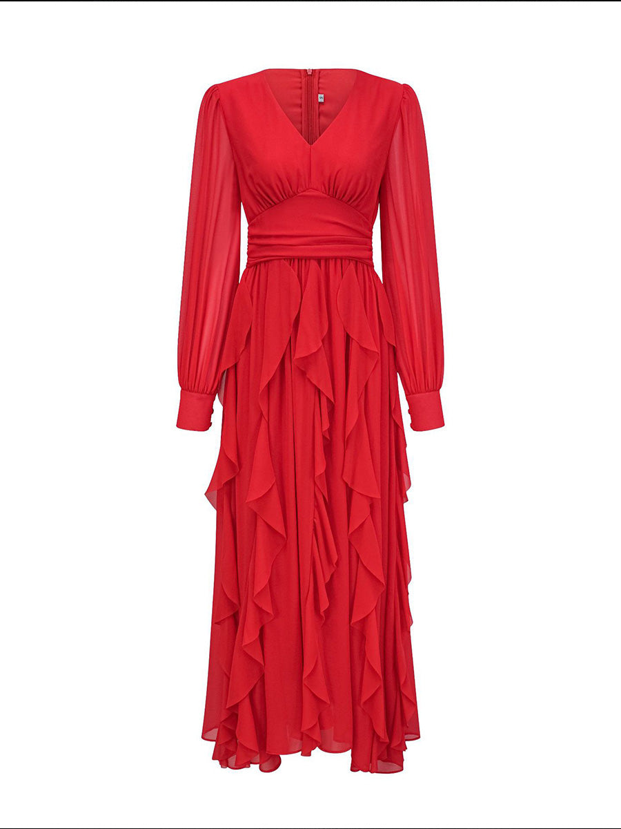 Red dress with long sleeves and ruffled layers on a white background