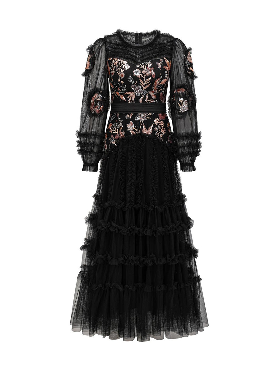 Black dress with floral embroidery on a white background