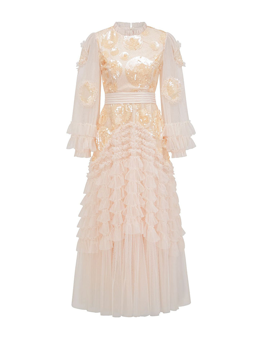 Elegant dress with equin flower and ruffled layers on a white background